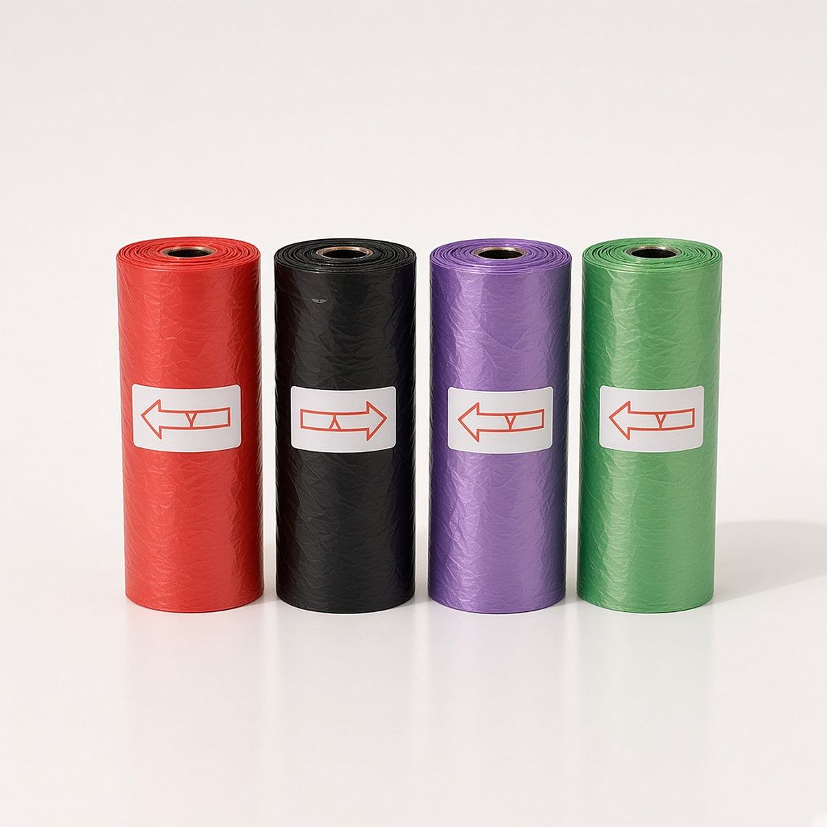 Poop-bag rolls included with the pouch: red, black, purple and green