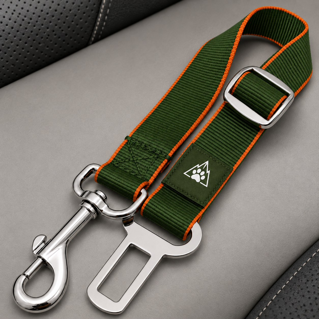 Matching forest-green and orange car tether included with the KIBOPAW seat cover