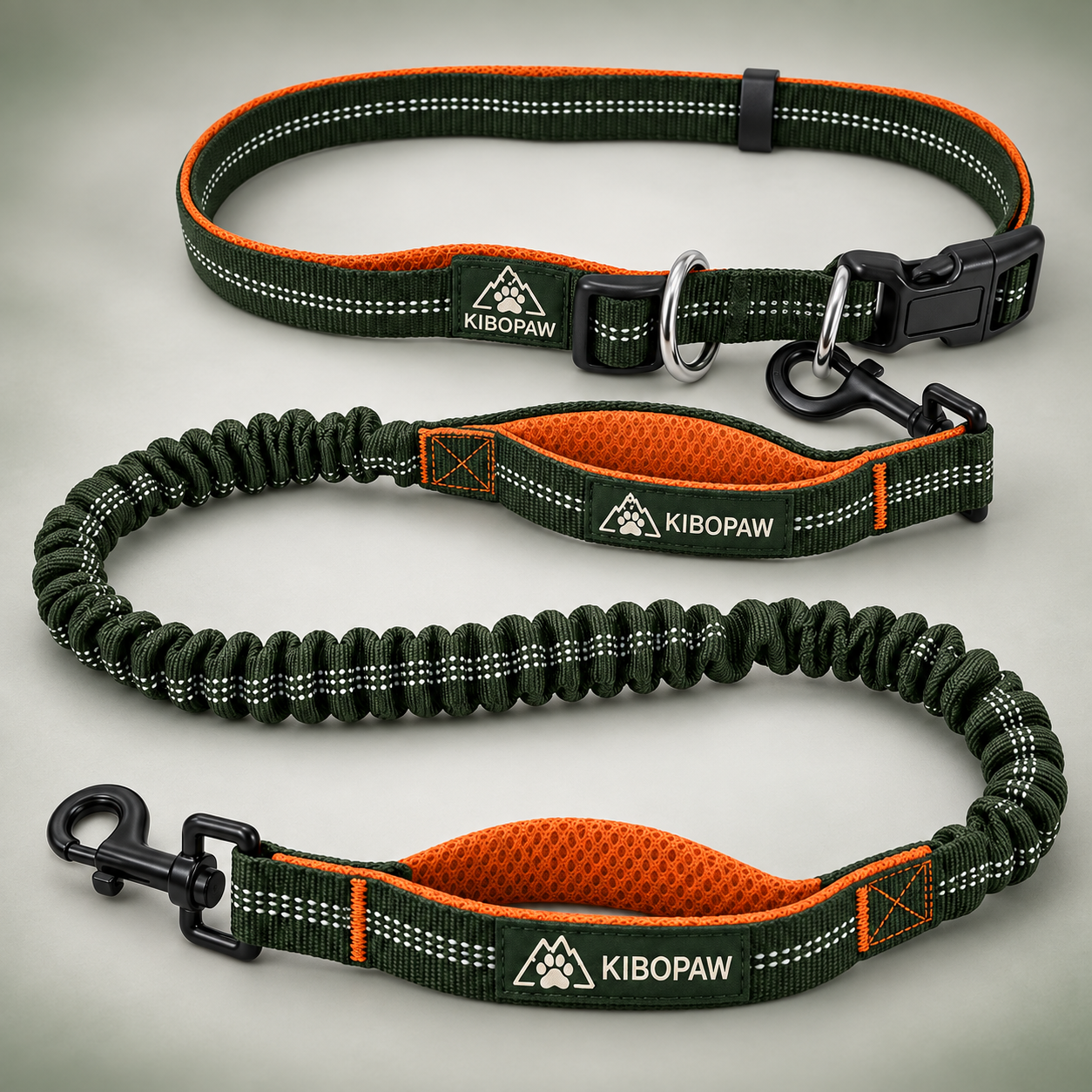 KIBOPAW waist leash showing the waist belt, padded handles, and bungee construction
