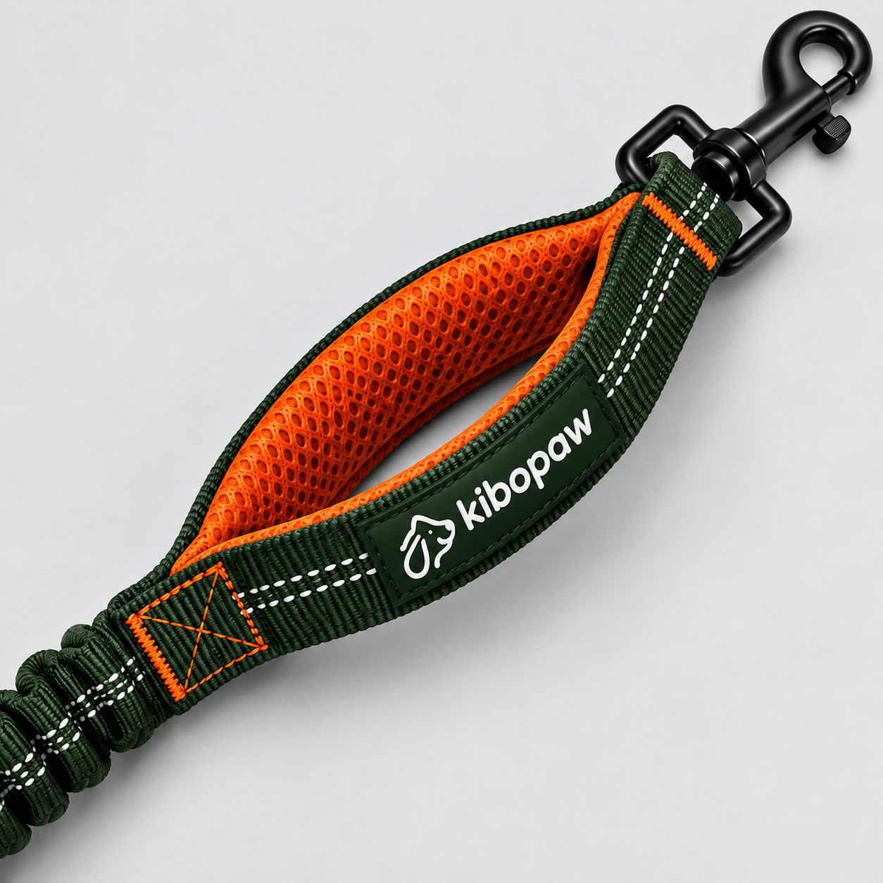 Close view of one orange-lined padded handle, reflective stitching, and swivel snap